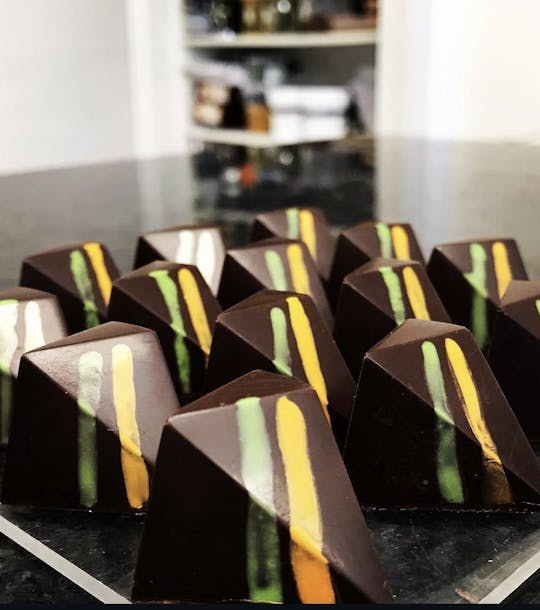 handmade chcolate with green and yellow stripes
